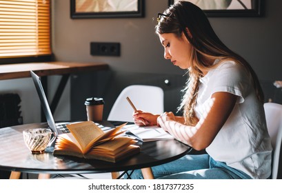Student writing an academic essay